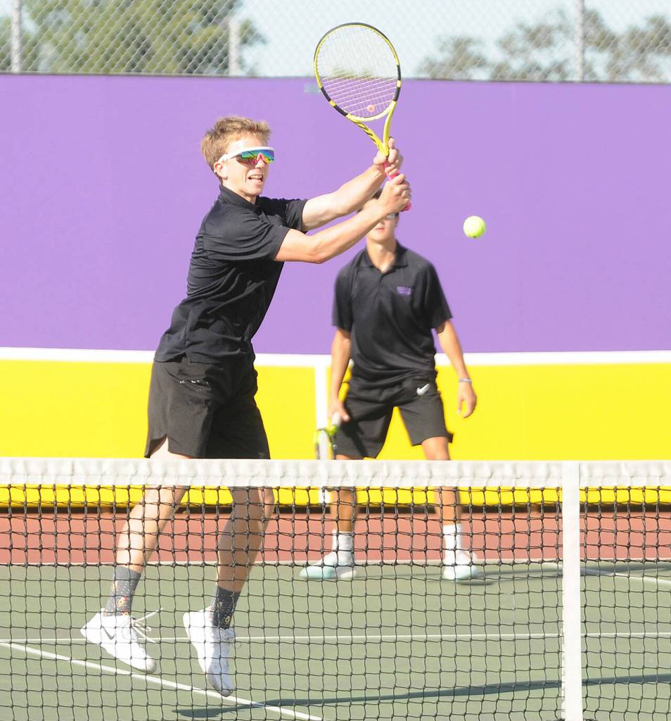 Sequims Jack Van De Wege, left and Henry Hughes win a point in the first set of a 6-3, 6-3 win over Bremertons Casey Pritchard and Sandro Tang on Sept. 9. Sequim Gazette photos by 
Michael Dashiell