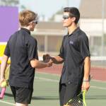 Sequims Jack Van DeWege and Henry Hughes celebrate a point in the first set of a 6-3, 6-3 win over Bremertons Casey Pritchard and Sandro Tang on Sept. 9. Sequim Gazette photo by Michael Dashiell