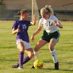 Sequim freshman Ivy Barrett, left, and Port Angeles Maya Gentry vie for possession in the first half of the Roughriders 3-1 road victory Sept. 9. Sequim Gazette photos by Michael Dashiell