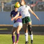 Sequims Kaia Lestage, left, and Port Angeles Catie Brown vie for the ball in the first half of the Roughriders 3-0.