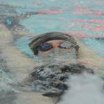 Sequims Lauren Sundin competes in the backstroke portion of the 200 medley relay in a Sept. 9meet against Bainbridge. Sequim Gazette photo by Michael Dashiell