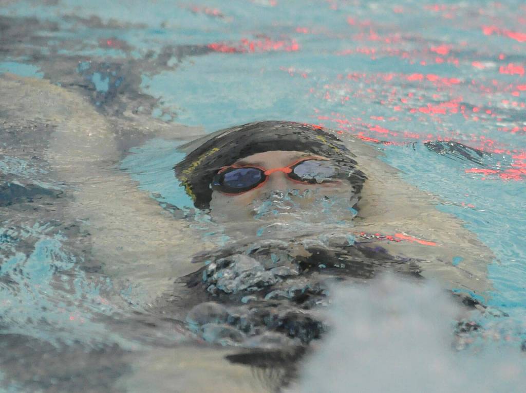 Sequims Lauren Sundin competes in the backstroke portion of the 200 medley relay in a Sept. 9meet against Bainbridge. Sequim Gazette photo by Michael Dashiell