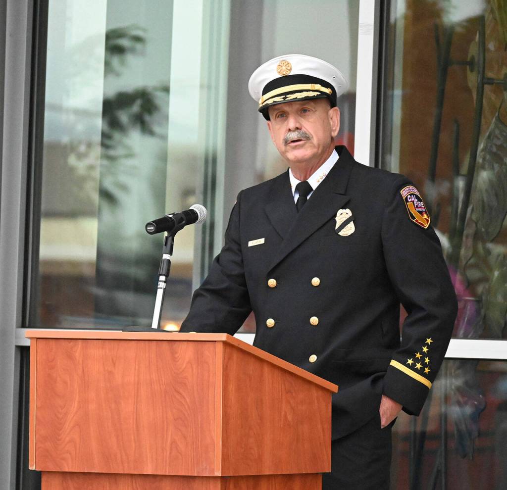 Sequim city councilor Keith Larkin speaks at a 9/11 ceremony at the Sequim Civic Center on Sept. 10. Larkin worked for 41 in the fire service with the California Department of Forestry and Fire Protection. Sequim Gazette photo by Michael Dashiell