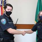 Sequim Police Chief Sherri Crain welcomes police officer Daniel Martinez to the local force. Martinez joined the department on Aug. 16.