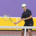 Sequims Henry Hughes looks to hit a forehand winner as he and teammate Jack Van De Wege top Olympics Jonathan Mourich and Chris Posis in straight sets (6-0, 6-1) on Sept. 22. Sequim Gazette photo by Michael Dashiell