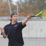 Sequims Espn Judd rips a forehand volley as he and teammate Kaiden Jones take on Olympics Warner Alexander and Freddy Enamorato on Sept. 22 in Sequim. Jones and Judd won, 6-2, 6-1, as the Wolves swept the Trojans 7-0. Sequim Gazette photo by Michael Dashiell