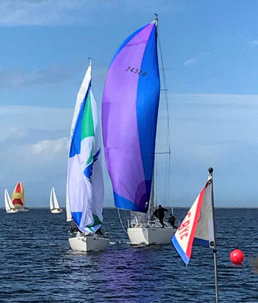 Litonya, skippered by Mike Kalahar of Port Angeles, is on the left, edging Windchild, skippered by Rudy Heessels of Sequim. In back, Sirius (Soren Prip), Denali (Bob Macaulay) and Pinafore (Bernie Armstrong), all of Sequim. Photo by Anna Richmond, Gail Spurr