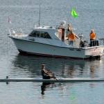 Ron Moller of Port Townsend crosses the finish line in first place, clocking in at 52:38.4. Photo by Dennis Miller
