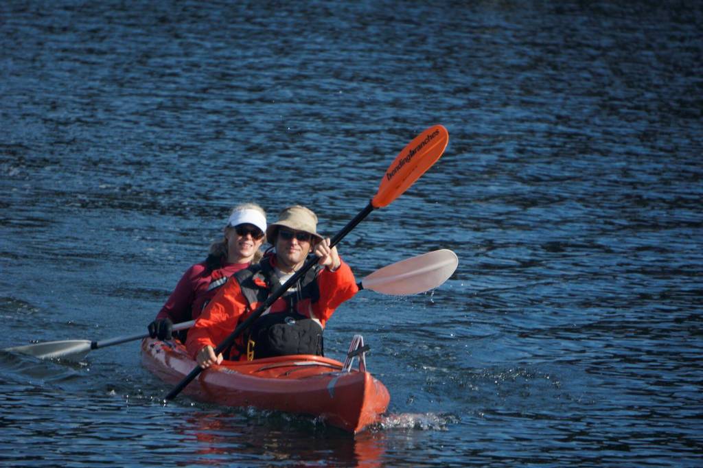 Sequims Sean and Cristina Eppers, representing Volunteer Hospice of Clallam County  where Cristina is a nurse  finish first in their double kayak class and 12th overall at the 2021 Row for Hospice race with a time of 1:49:57.3. Cristina had crewed the day prior for on skipper Durkee Richards Sirius, at the Reach for Hospice race. Photo by Durkee and Mary Jeanne Richards