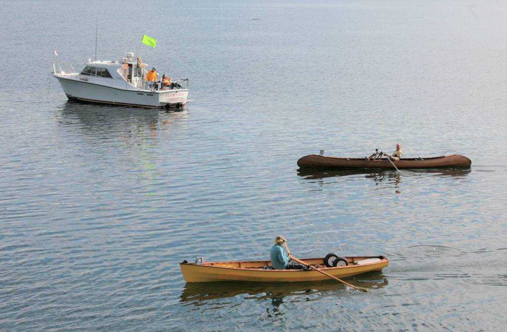 Sequims Kip Tulin (foreground) and Robbie Niclas complete the 2021 Row for Hospice race on Sept. 19. Photo by Dennis Miller