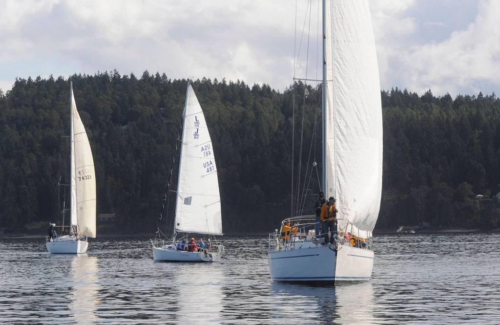 Sailboats gather near the starting line of the 2021 Reach for Hospice race on Sequim Bay on Sept. 18. Sequim Gazette photo by Michael Dashiell