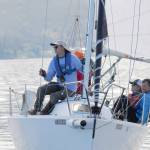 A calm before the race: Crew members of the Litonya prep for the 2021 Reach for Hospice competition on Sequim Bay on Sept. 8. Pictured, from left, are Nick Benge, skipper Mike Kalahar, Dan Kasseler and Greg Halberg. Sequim Gazette photo by Michael Dashiell