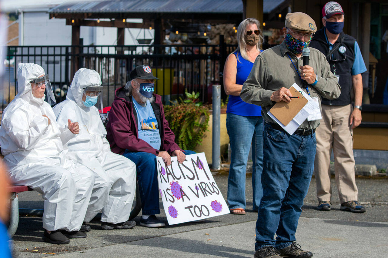 Tim Wheeler speaks at a rally in Sequim on Sept. 18 in Sequim. Wheeler is the spokesperson for Voices for Health and Healing. Sequim Gazette photo by Emily Matthiessen