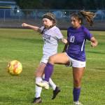 Sequims Jennyfer Gomez, right, vies for the ball with Bainbridges Gabby Weis in the Wolves home match-up on Sept. 21. Bainbridge won on penalty kicks after the teams were knotted 1-1 at the end of regulation. Sequim Gazette photo by Michael Dashiell