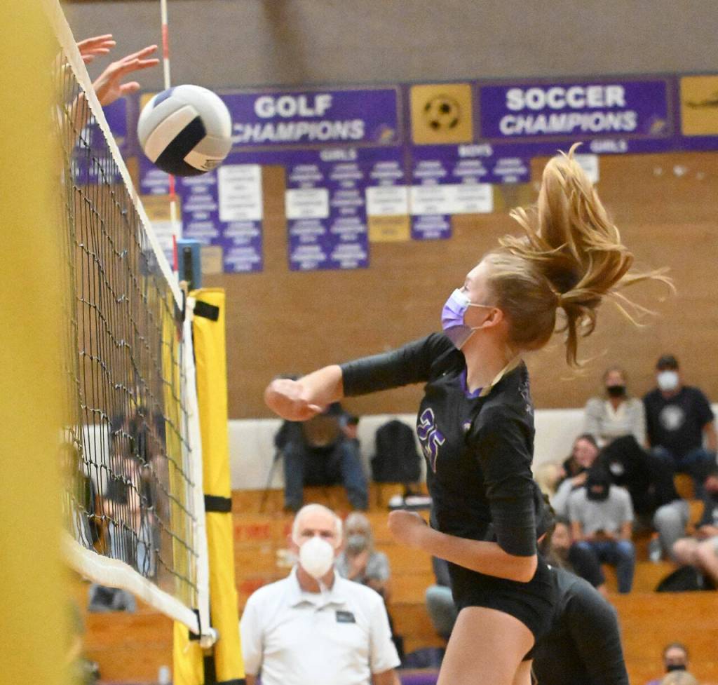 Sequims Jolene Vaara looks to hit past a block in the Wolves Sept. 21 match-up with Bainbridge. Sequim Gazette photo by Michael Dashiell