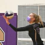 Sequims Kendall Hastings prepares a serve in the Wolves Sept. 21 home match against Bainbridge. Sequim Gazette photo by Michael Dashiell