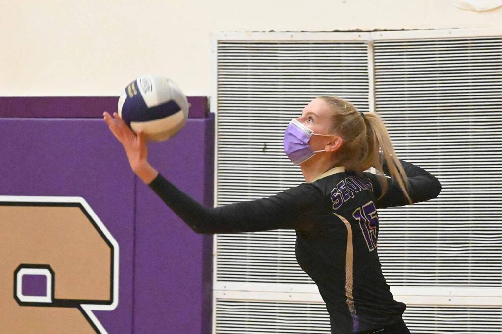 Sequims Kendall Hastings prepares a serve in the Wolves Sept. 21 home match against Bainbridge. Sequim Gazette photo by Michael Dashiell