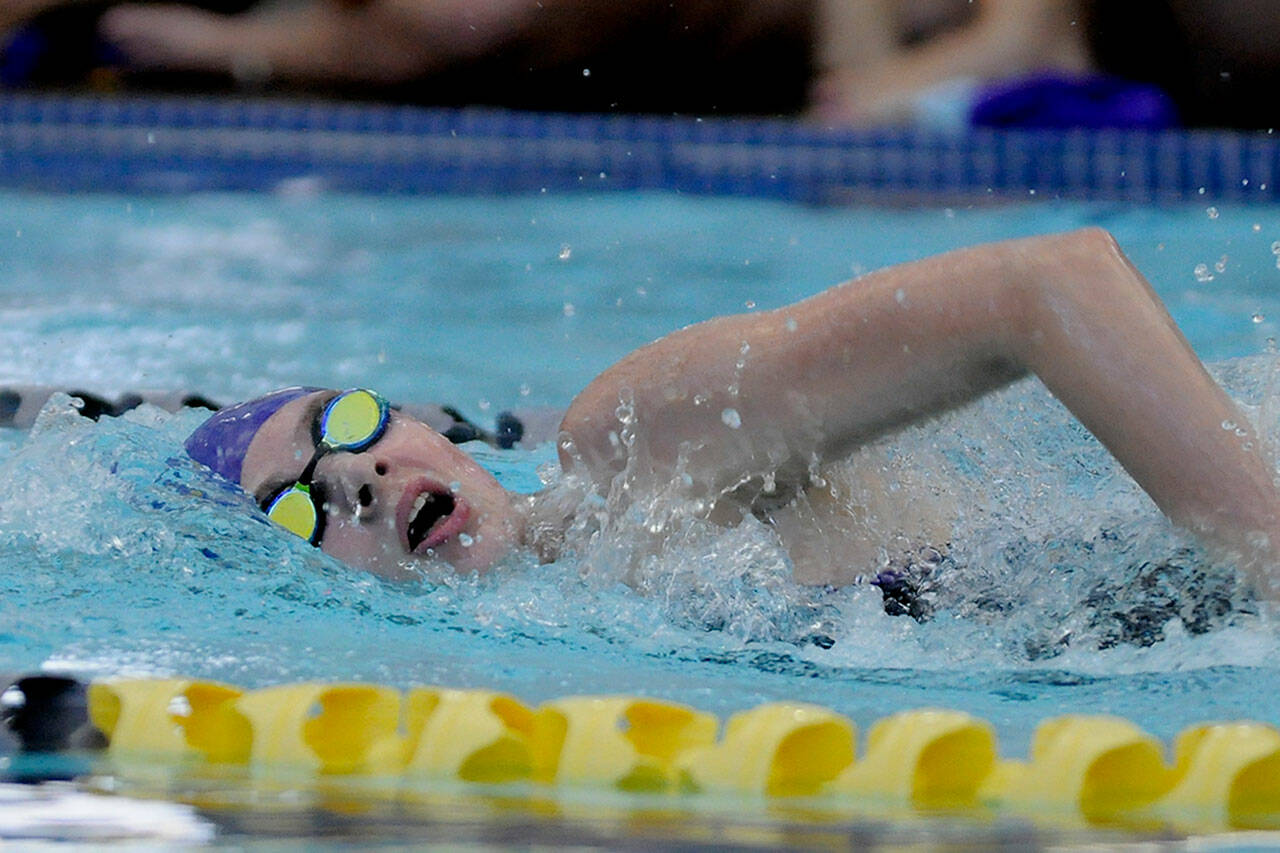 Sequims Mia Coffman swims to a district meet qualifying time in the 200 free (2:09) in the Wolves double dual meet against Kingston and North Kitsap on Sept. 23. Sequim Gazette photo by Michael Dashiell