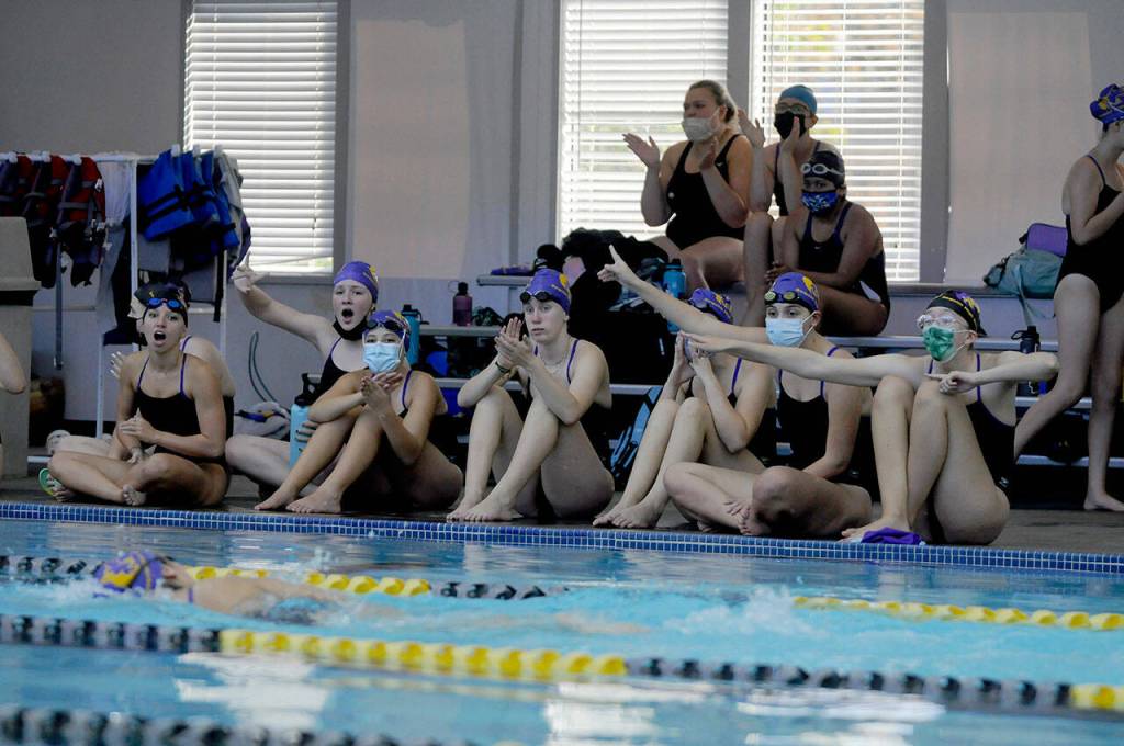 Sequim High swimmers cheer on their teammates in the 200meters at a double dual meet against Kingston and North Kitsap last week. Sequim Gazette photo by Michael Dashiell
