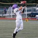 Sequims Ricky Jennings turns back to make the reception before turning upfield against Bainbridge in a Sept 24 Olympic League match-up. Bainbridge won, 48-10. Photo by Mark Krulish/Kitsap News Group