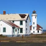 The U.S. Lighthouse Society is hosting a kickoff event at 3 p.m. Tuesday, Sept. 28, at the Point Wilson Lighthouse to highlight the next phase of renovations for the lighthouse and its two dwellings. Photo by Zach Jablonski/Olympic Peninsula Daily News Group