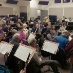About 40 musicians pack into Swisher Hall for a rehearsal in 2016. Photo by Richard Greenway