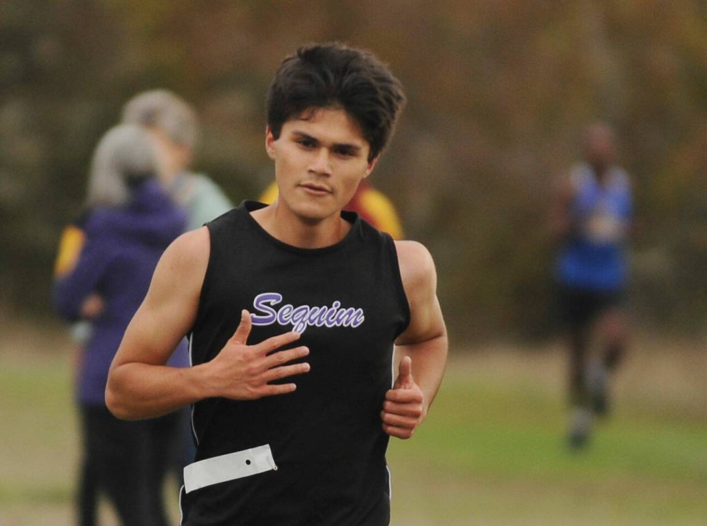 Sequims Calem Klinger was the Wolves No. 2 runner at the Sept. 29 Olympic League meet, placing 26th overall in 20:08, about 12 seconds off a personal 5k best. Sequim Gazette photo by Michael Dashiell