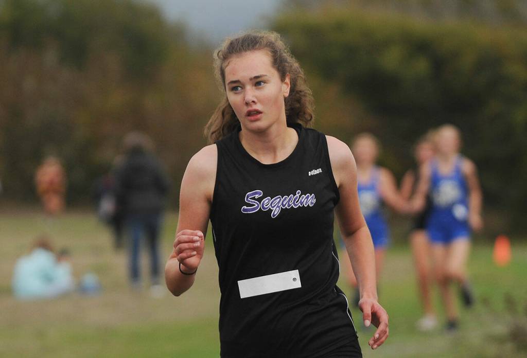 Sequims Anastasia Updike competes in a Sept. 29 Olympic League meet in Sequim. She placed 17th overall in 24:47. Sequim Gazette photo by Michael Dashiell