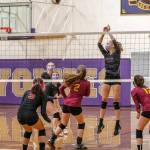 From back left: Sequims Kendall Hastings, Jordan Kidd and Jolene Vaara keep an eye on the ball as the Wolves take on  and beat  Kingston on Sept. 28. Sequim Gazette photo by Emily Matthiessen