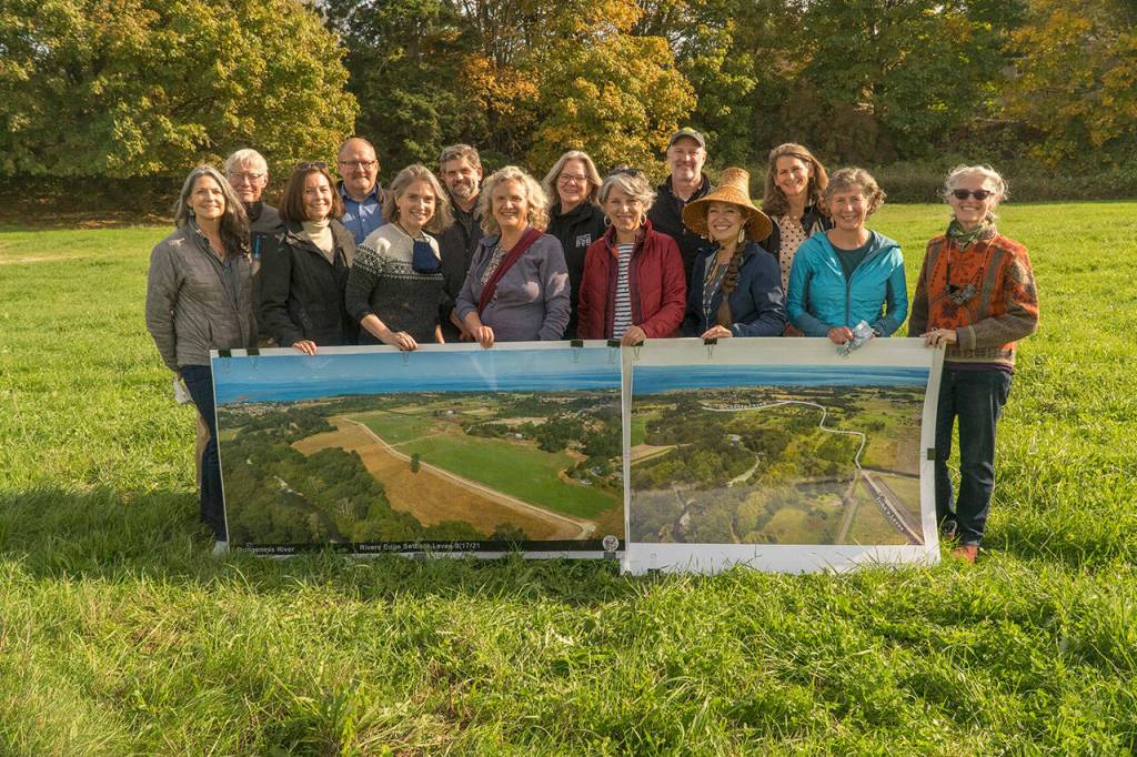 State and local officials gather before meeting with Gov. Jay Inslee at the site of the Lower Dungeness Floodplain Restoration efforts on Oct. 1. Pictured are (back row, from left): Jamestown SKlallam Tribes Randy Johnson; Department of Fish and Wildlifes Brian Phillips; Clallam County commissioner Mark Ozias; North Olympic Land Trusts Karen Westwood and Tom Sanford, and tara Galuska, Governors Salmon Office Orca Recovery Coordinator, with (front row, from left): Department of Ecologys Joenne McGerr; Washington Recreation & Conservation Offices Megan Duffy; Laura Blackmore of Puget Sound Partnership; Cheryl Baumann, North Olympic Lead Entity for Salmon; Clallam County Department of Community Developments Mary Ellen Winborn; Jamestown SKlallam Tribes Loni Greninger and Hansi Hals, and Clallam Countys Cathy Lear. Photo by John Gussman