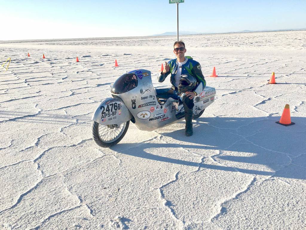 Alan McMurray is all smiles after posting a world record run at the World Finals at the Bonneville Salt Flats. Photo courtesy of George McMurray