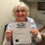 Race Mom Connie McMurray displays the logo she created for the Tri-Mac Speedsters. Photo courtesy of George McMurray