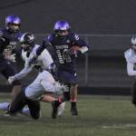 Sequims Kobe Applegate breaks free for a big gain in the first quarter of the Wolves 49-7 loss to league-leading North Kitsap on Oct. 8. Sequim Gazette photo by Michael Dashiell
