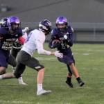 ​​Sequims Kobe Applegate looks to run after catching a pass from Lars Wiker in the first half of the Wolves 49-7 loss to North Kitsap Friday night. Sequim Gazette photos by Michael Dashiell