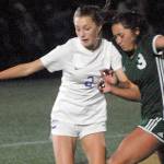 Keith Thorpe/Peninsula Daily News
Sequim's Mikiah Winter, left, battles for control with Port Angeles' Piper Williams on Tuesday in Port Angeles.