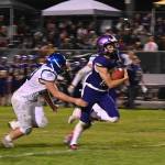 Sequims Aiden Gockerell breaks free for a big gain in the Wolves 29-28 win over North Mason on Oct. 16. Sequim Gazette photo by Michael Dashiell