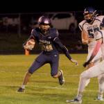 Sequim receiver Isaiah Moore breaks into the yardage after a catch in the first half of Sequims 29-28 win over North Mason on Oct. 16. Applegate led the team with 84 receiving yards. Sequim Gazette photo by Michael Dashiell