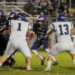 Sequims Aiden Gockerell, center, looks for running room in the Wolves 29-28 win over North Mason on Oct. 16. Sequim Gazette photo by Michael Dashiell