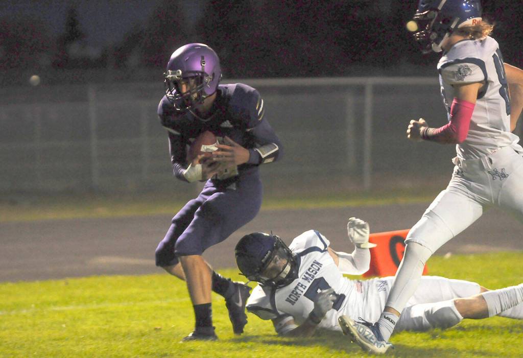 Sequim receiver Brandon Wagner hauls in an 11-yard touchdown catch from Lars Wiker as the Wolves top North Mason at Friday nights Homecoming game. Sequim Gazette photo by Michael Dashiell