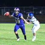 Sequim quarterback Lars Wiker tries to escape a sack in the second half of the Wolves 29-28, come-from-behind win. Sequim Gazette photo by Michael Dashiell
