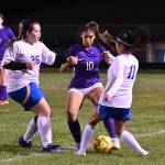 With teammate Kaia Lestage (left) looking on, Sequims Jennyfer Gomez vies for possession in the Wolves 6-0 win Tuesday night against visiting Bremerton. Sequim Gazette photos by Michael Dashiell