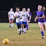 Sequims Teagen Moore, right, chases down a ball deep in Bremerton territory in the Wolves 6-0 win over the visiting Knights on Oct. 19. Sequim Gazette photo by Michael Dashiell