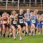 Sequim High senior Riley Pyeatt breaks from the starting line and leads the Olympic League championship race from start to finish. Shell be a favorite among the top runners at the West Central District meet on Oct. 30. Sequim Gazette photo by Michael Dashiell