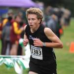 Sequim High junior Colby Ellefson races to the finish line at the Olympic League championships on Oct. 21. Ellefson placed third overall. Sequim Gazette photo by Michael Dashiell