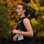 Sequims Mia Kirner races at the Olympic League championships at The Cedars at Dungeness golf course on Oct. 21. Kirner placed 44th in a personal best 24:53. Sequim Gazette photo by Michael Dashiell