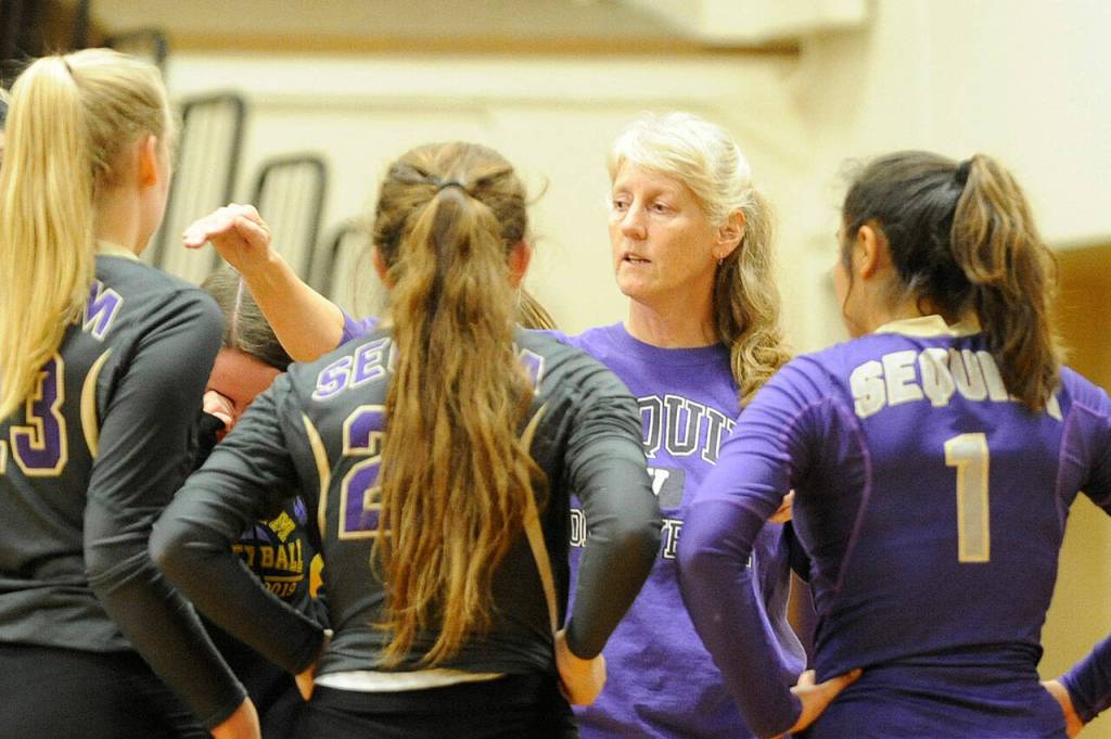 SHS head coach Jennie Webber Heilman talks with players in a 2019 match. Sequim Gazette file photos by Michael Dashiell