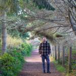 Steve Moore, one of the founders of Camp N Car pauses on a walk that is the favorite of many generations here in Sequim. Moore grew up in Sequim and together with his childhood Martin Nerbovig, started the company in March of 2019. Despite beginning when the COVID-19 Pandemic caused shut-downs, the company quickly developed a niche, has doubled its team and moved into a bigger workspace, and sells its products across the United States. Camp N Car offers kits to transform vehicles into homes on wheels and does custom conversions at its Port Townsend shop. Sequim Gazette photo by Emily Matthiessen