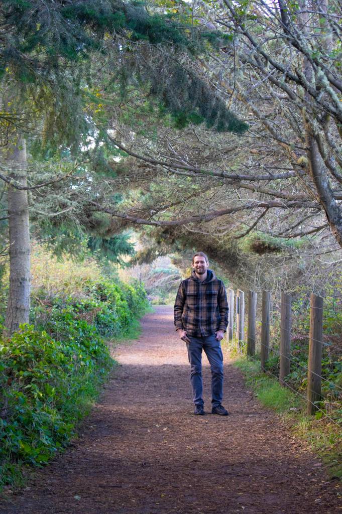 Steve Moore, one of the founders of Camp N Car pauses on a walk that is the favorite of many generations here in Sequim. Moore grew up in Sequim and together with his childhood Martin Nerbovig, started the company in March of 2019. Despite beginning when the COVID-19 Pandemic caused shut-downs, the company quickly developed a niche, has doubled its team and moved into a bigger workspace, and sells its products across the United States. Camp N Car offers kits to transform vehicles into homes on wheels and does custom conversions at its Port Townsend shop. Sequim Gazette photo by Emily Matthiessen