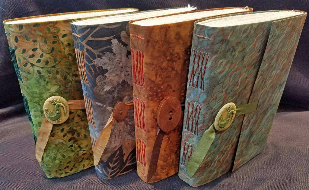 Softcover journals by Jean Wyatt, a featured artist at the Bumblebunching – Warped, Twisted, & Imperfect exhibition at Sequim Museum & Arts during the Nov. 5 First Friday Art Walk Sequim. Submitted photo
