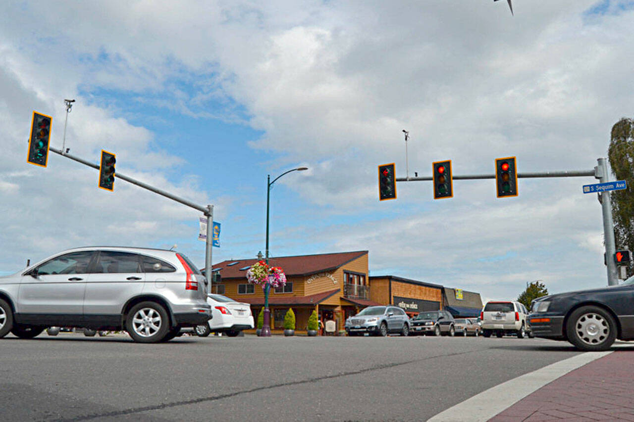 With only one bid for construction and an estimate almost double city staffs anticipated expenses, Sequim city councilors voted down a plan to replace traffic lights along Washington Street at the Sequim and Third Avenue intersections. Sequim Gazette file photo by Matthew Nash